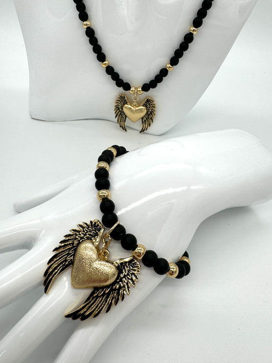 Onyx bracelet with a heart pendant with wings "Colibra"